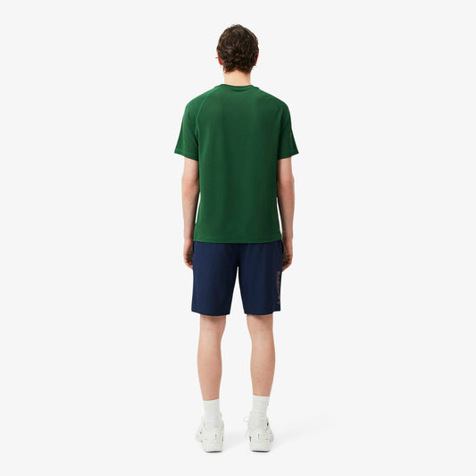 LacosteSportShortNavy-Orange2.avif