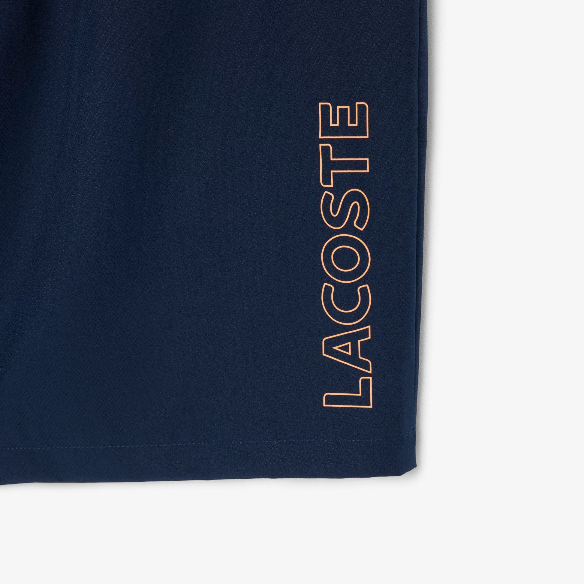 LacosteSportShortNavy-Orange5.avif